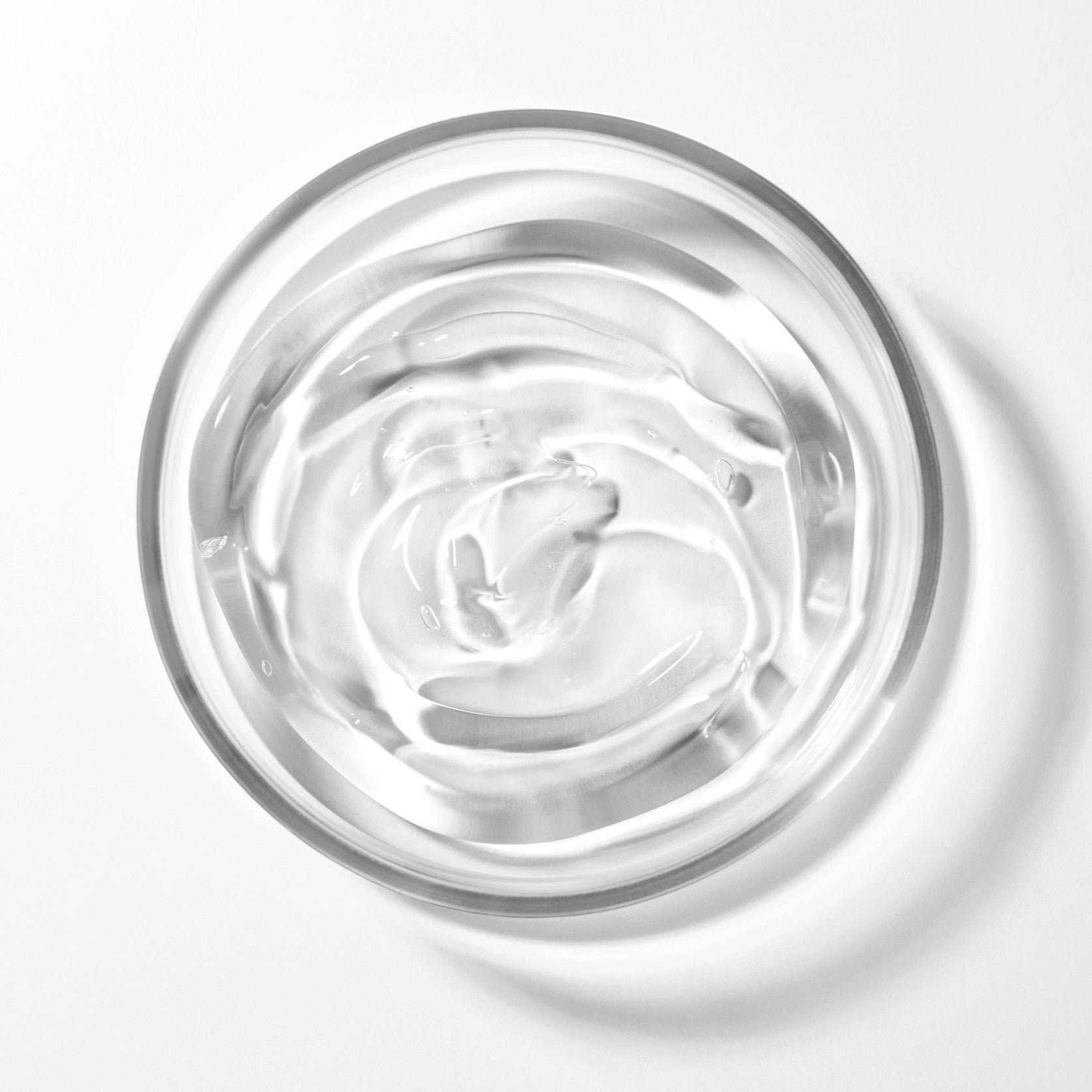 Natural Bisabolol in a clear glass bowl showcasing a pure, soothing skincare active used for calming sensitive skin and enhancing gentle formulations.