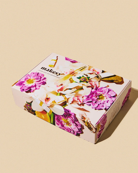 Makeup box with floral design and 'makesy' branding on a beige background
