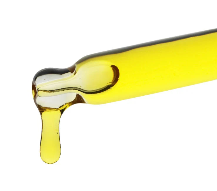 Clear glass dropper filled with Hydroxypinacolone Retinoate HPR on a white background