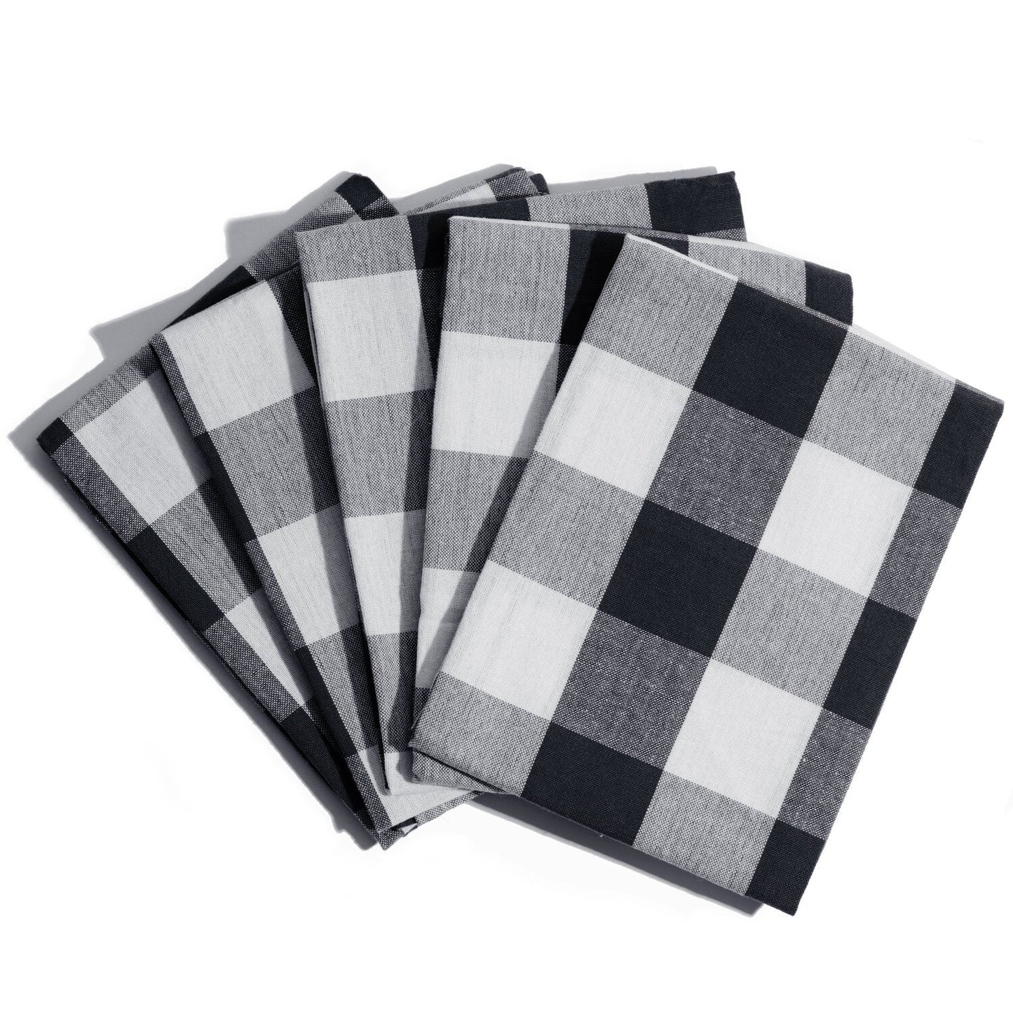 Set of black and white checkered napkins on a white background