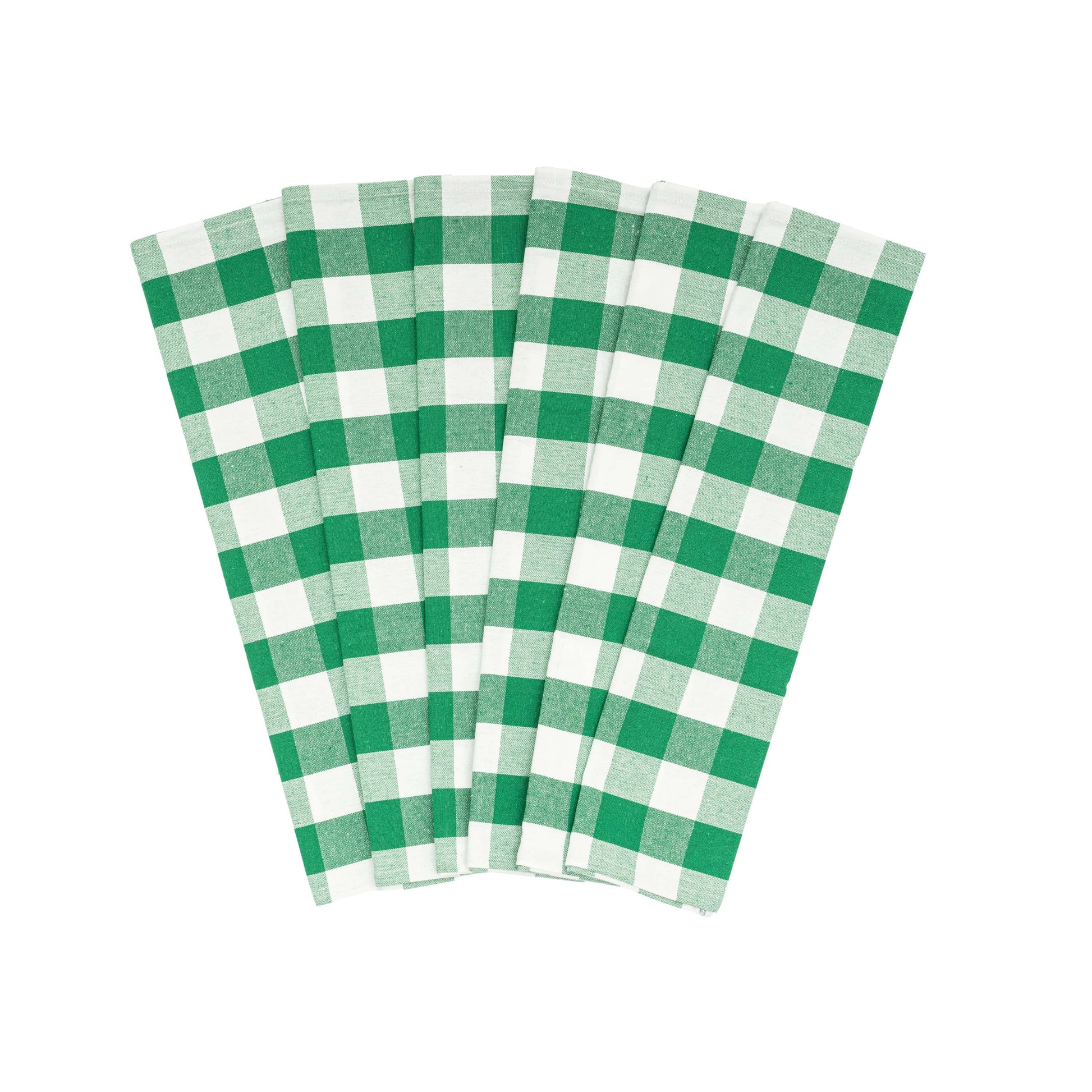 Set of green and white checkered napkins on a white background