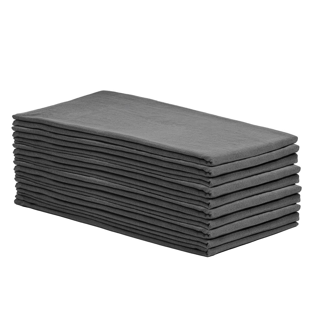 Stack of gray folded cloths on a white background