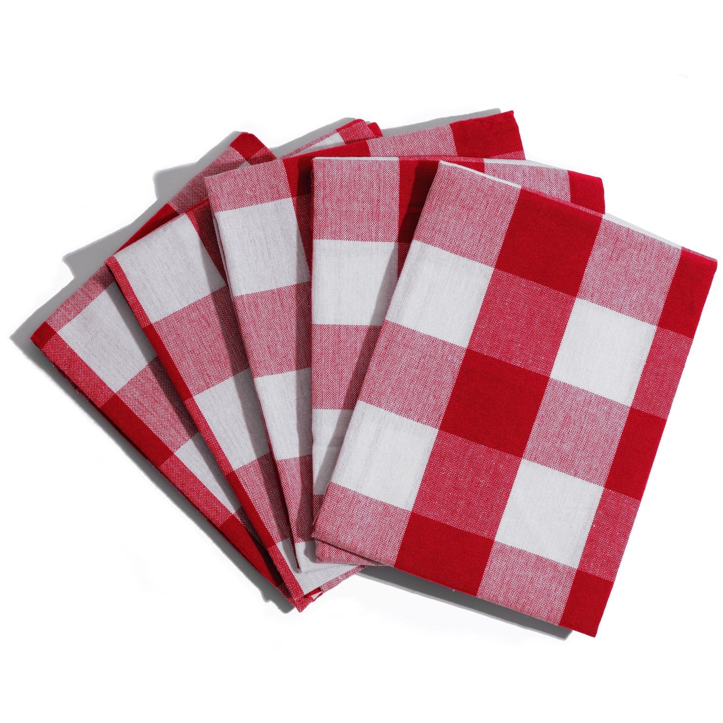 Set of red and white checkered napkins on a white background