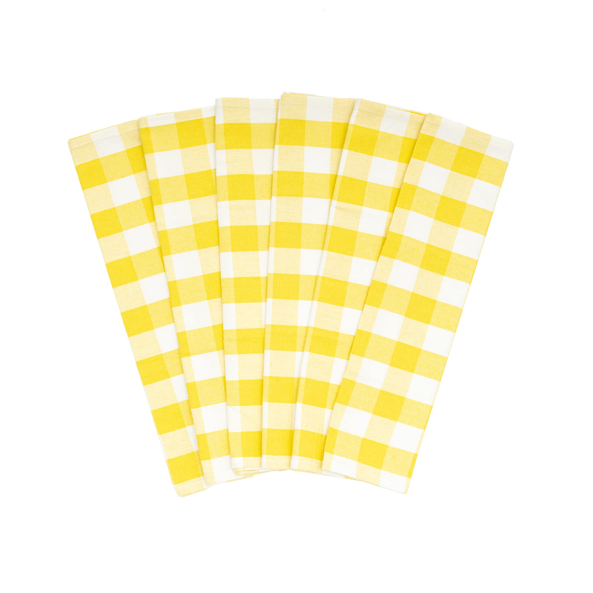Six yellow and white checkered napkins on a white background